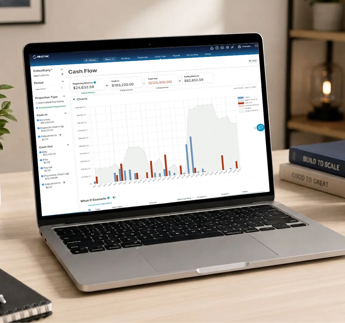 FINSYNC cash flow dashboard displayed on a laptop
