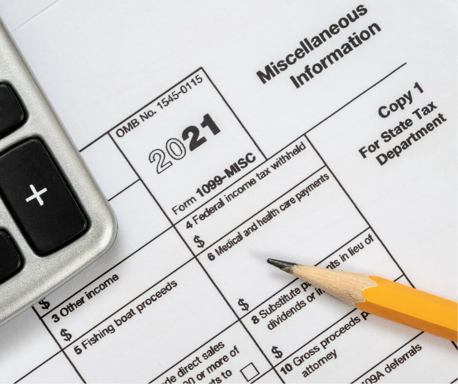 Person filling out 1099 NEC Tax Form