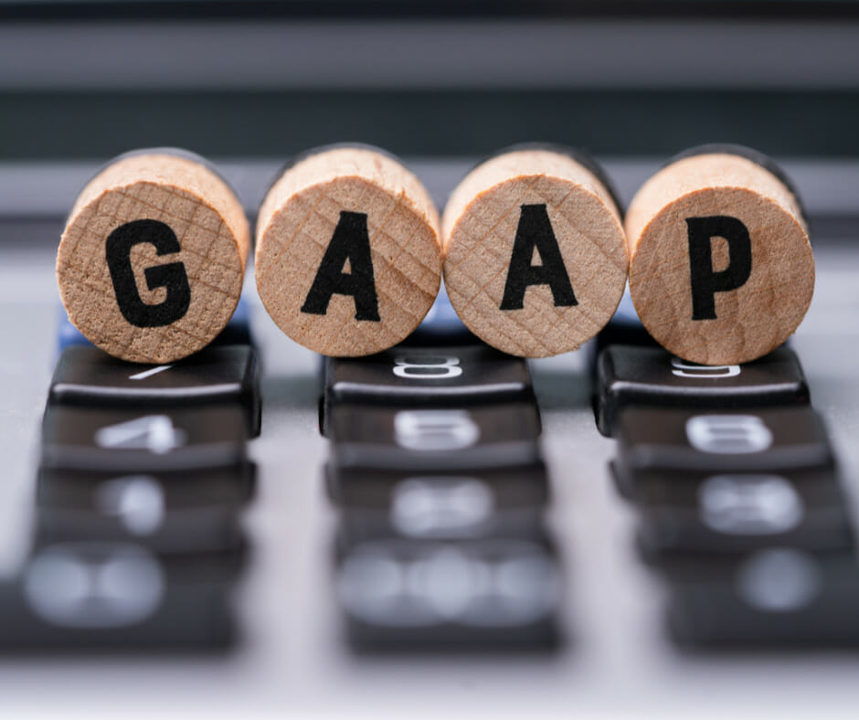 GAAP letters on top of a calculator