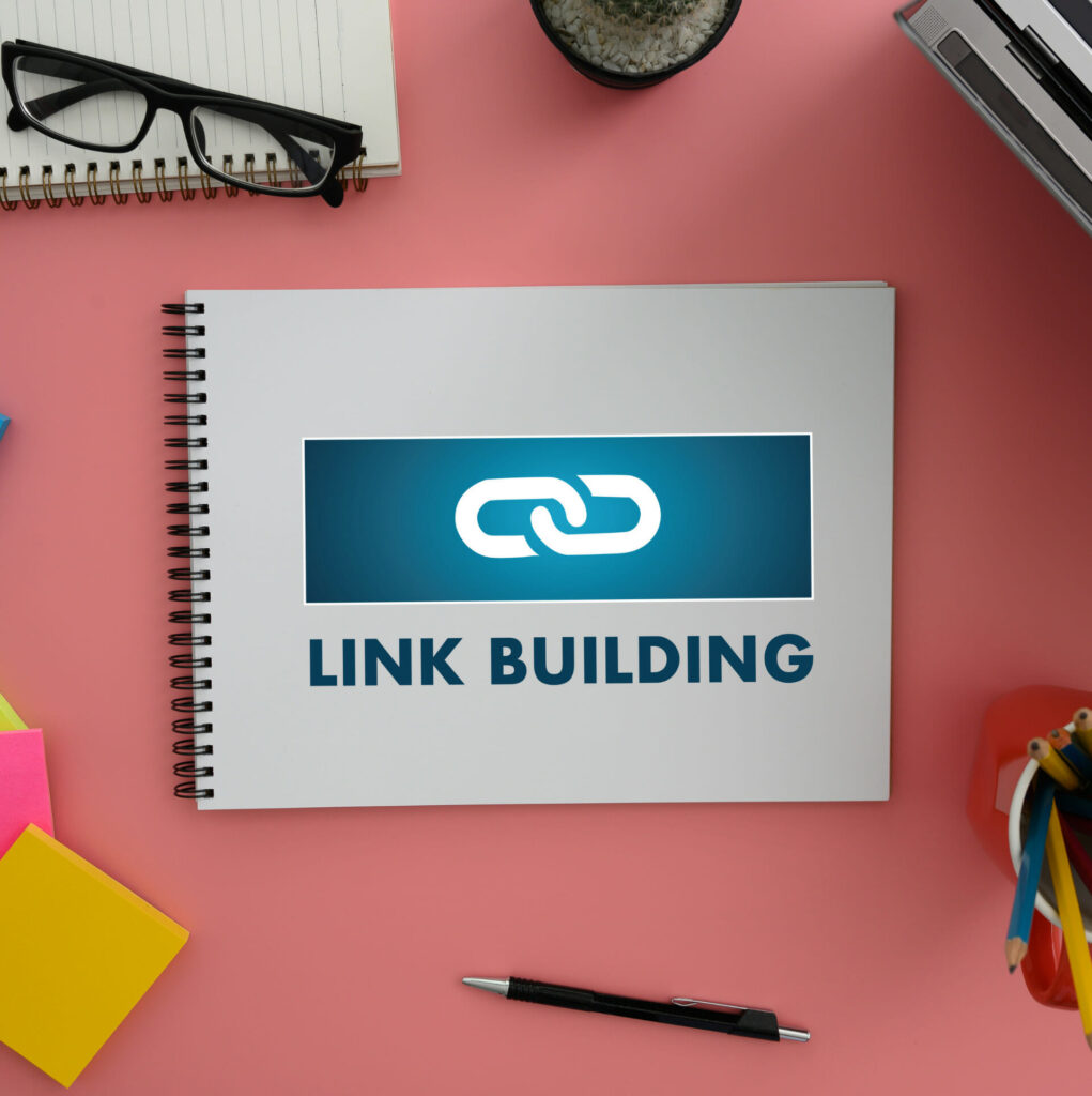 Pad of paper with link building written