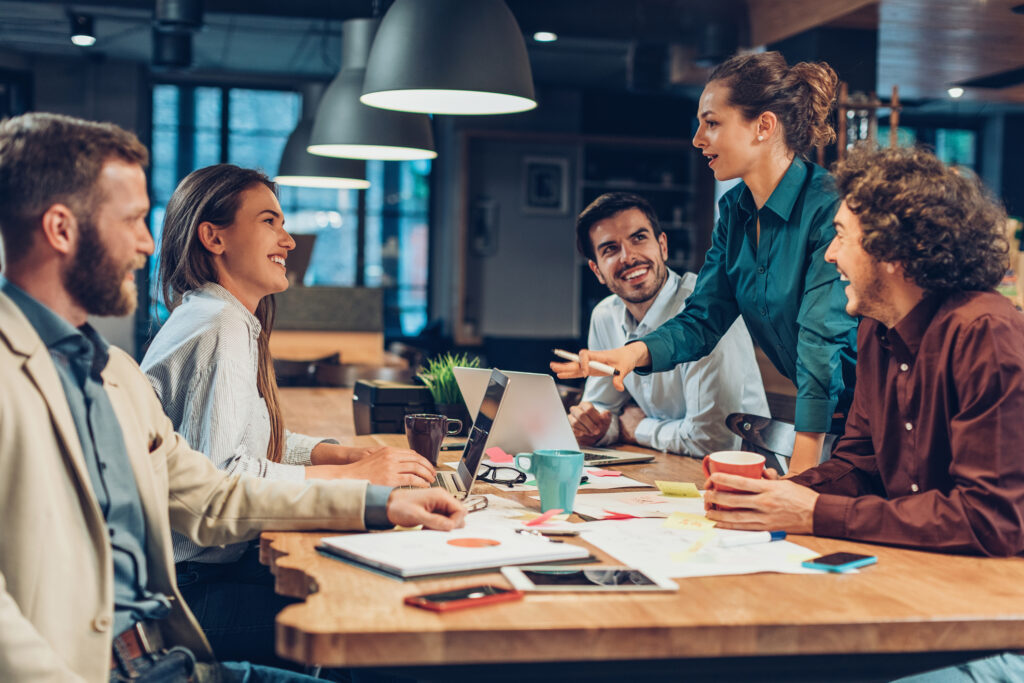 Group of people on a business meeting late in the evening