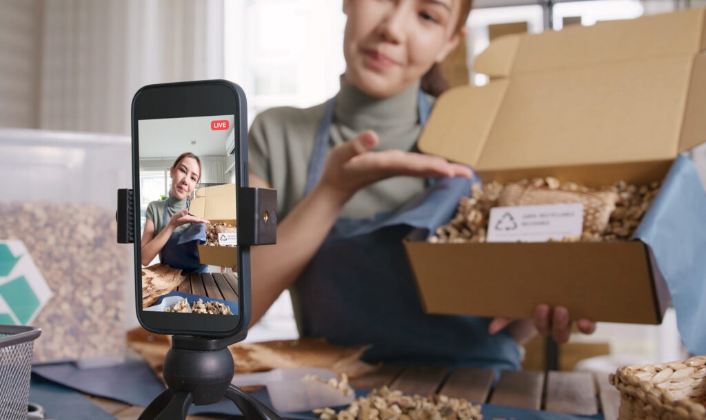 small business owner giving a live stream talk on phone