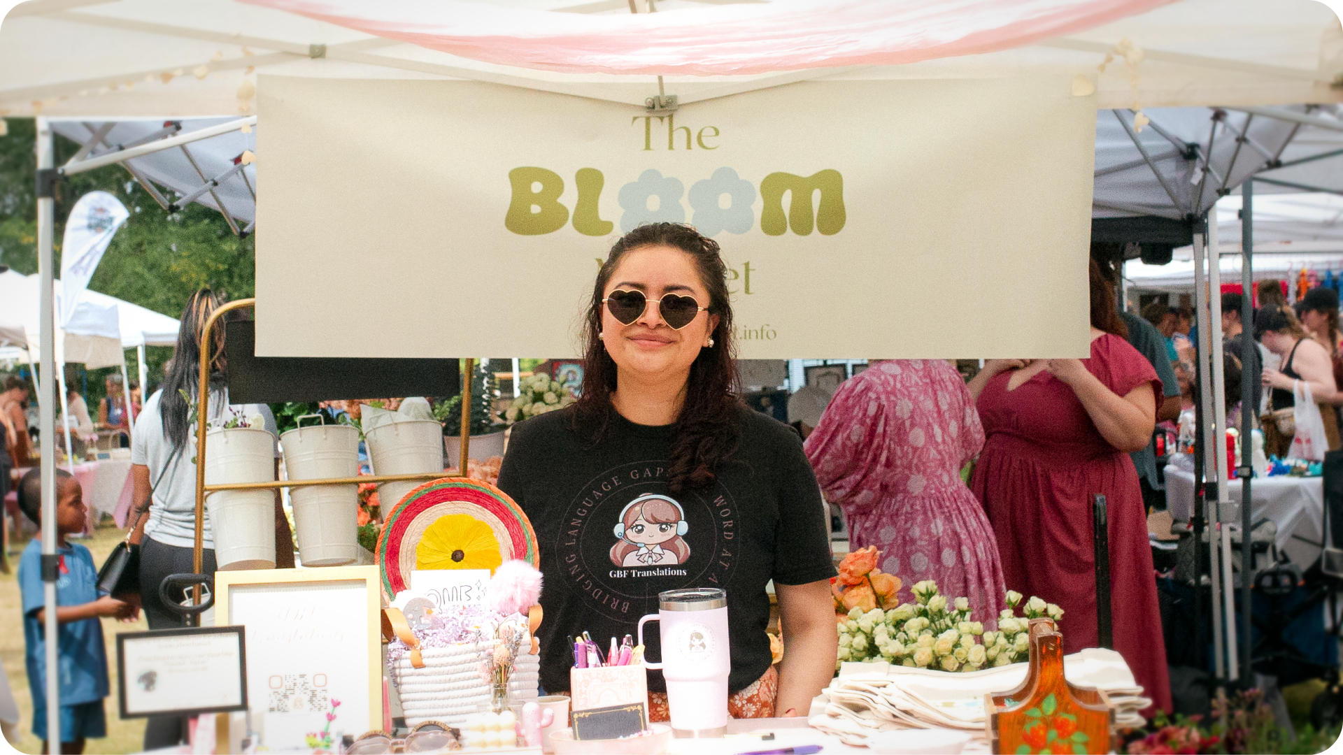 Organiser at Bloom Market maning a booth at their event 