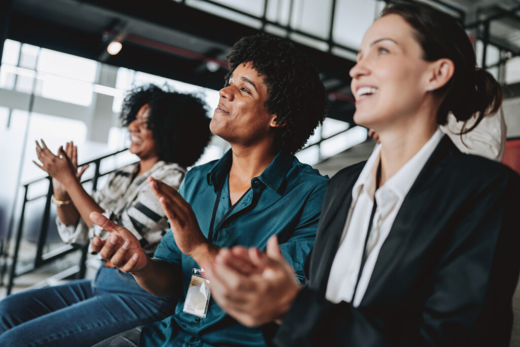 employees clapping for a presentation